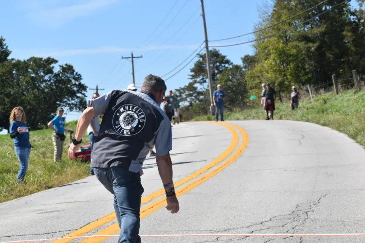 Slideshow: Revelers Take to the Pavement Saturday for Massive Irish Road Bowling Adventure